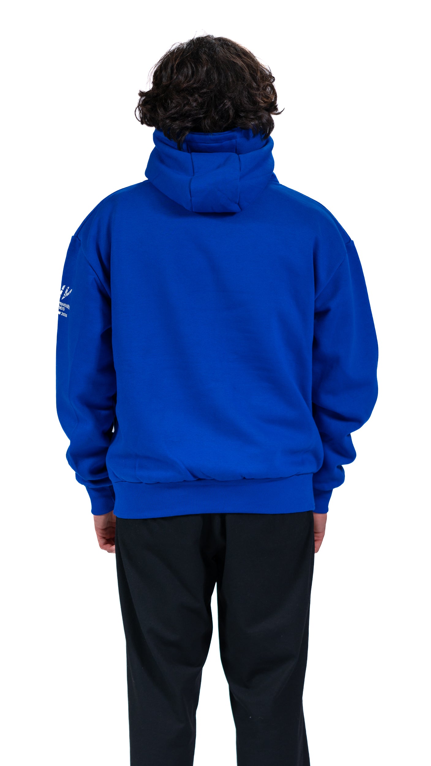 Back view of man wearing blue Glasgow 2026 Celebration graphic hoodie.