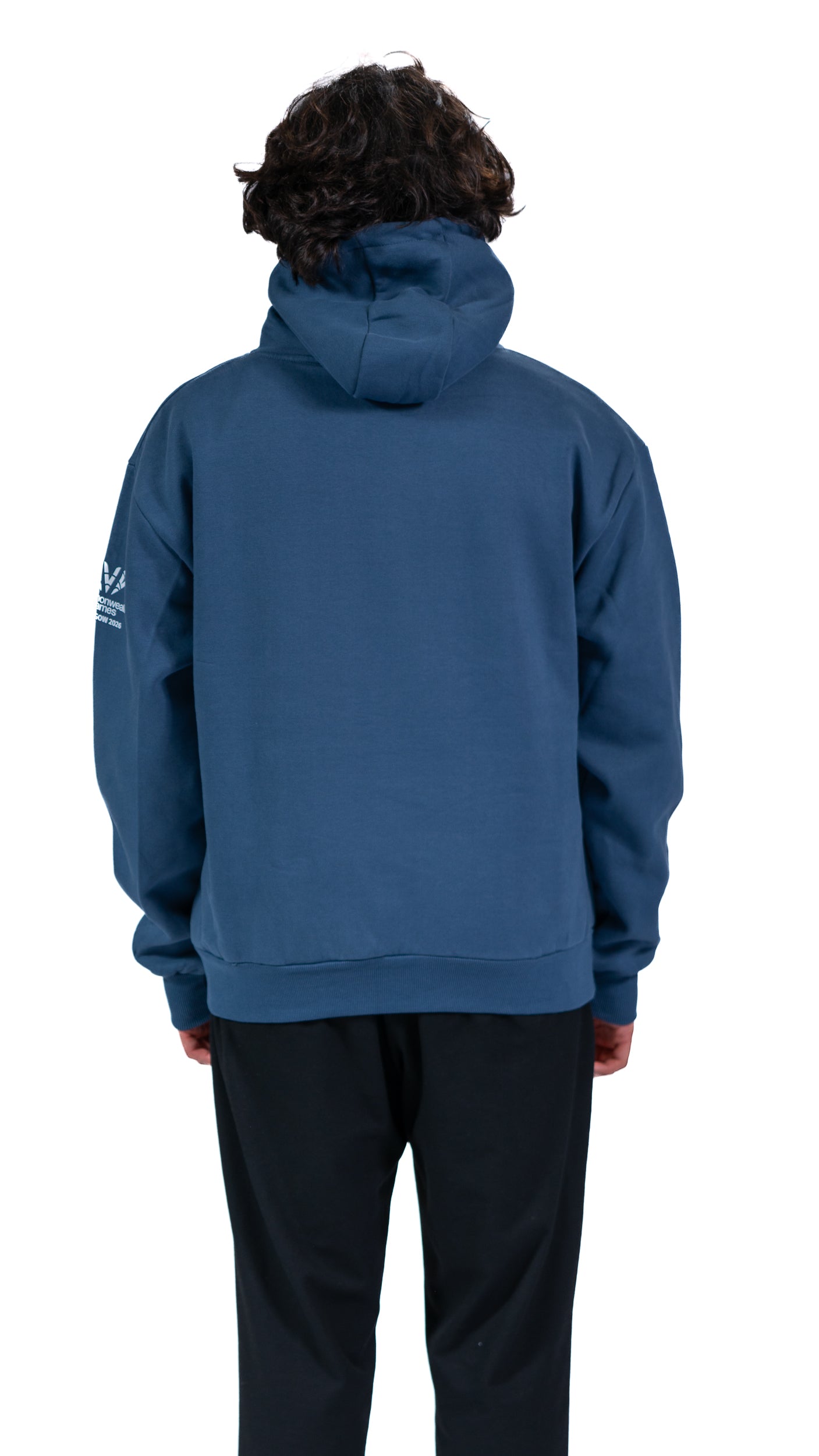 Back view of man wearing denim Glasgow 2026 Celebration graphic hoodie.
