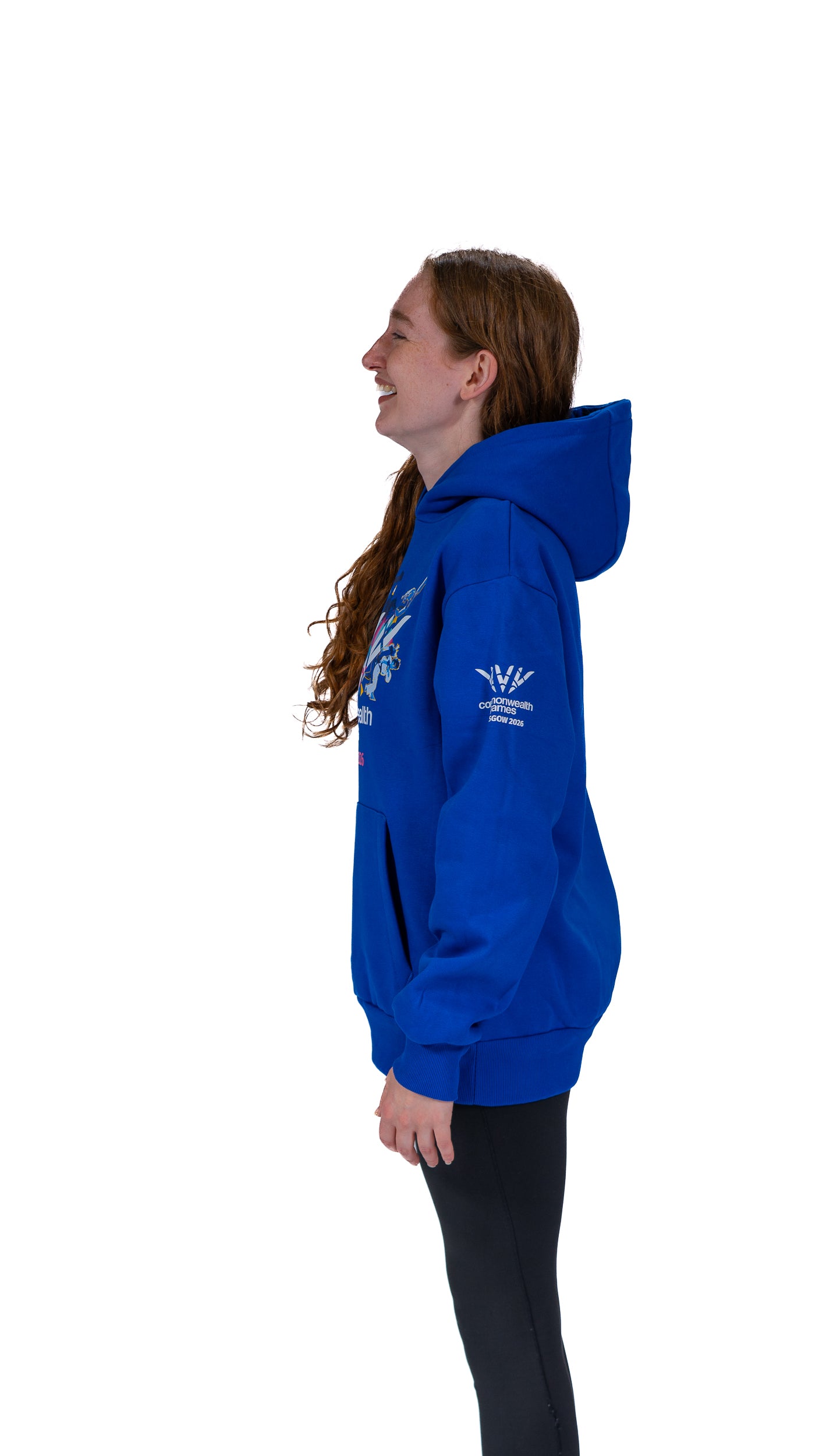 Side view of woman wearing blue Glasgow 2026 Celebration graphic hoodie.