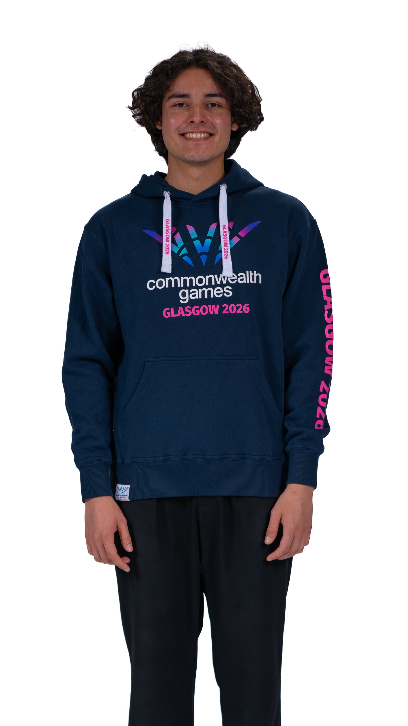 Man wearing unisex, navy hoodie with full colour Glasgow 2026 logo on the front and Glasgow 2026 on the sleeve.