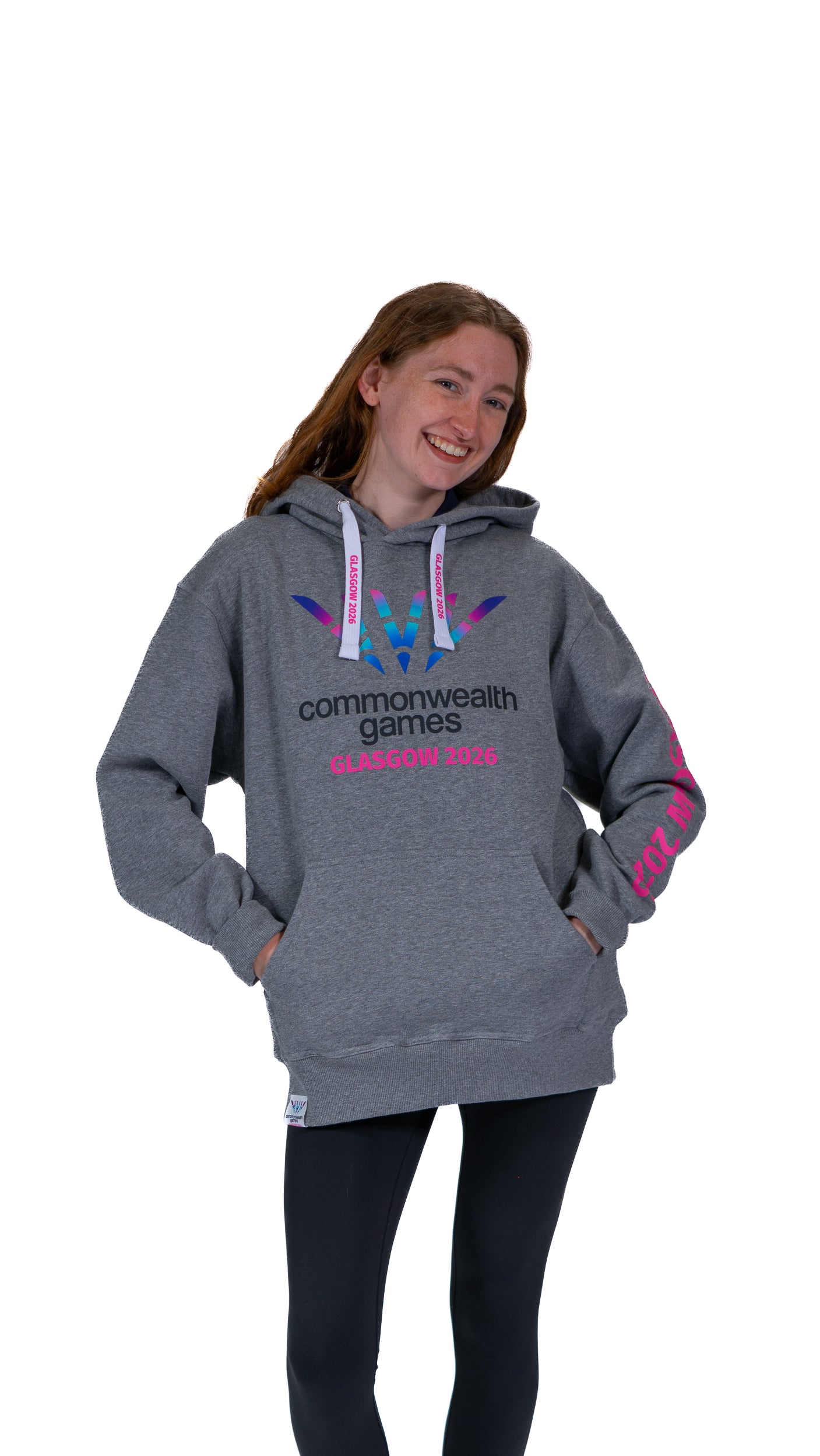 Woman wearing unisex, grey marl hoodie with full colour Glasgow 2026 logo on the front and Glasgow 2026 on the sleeve.