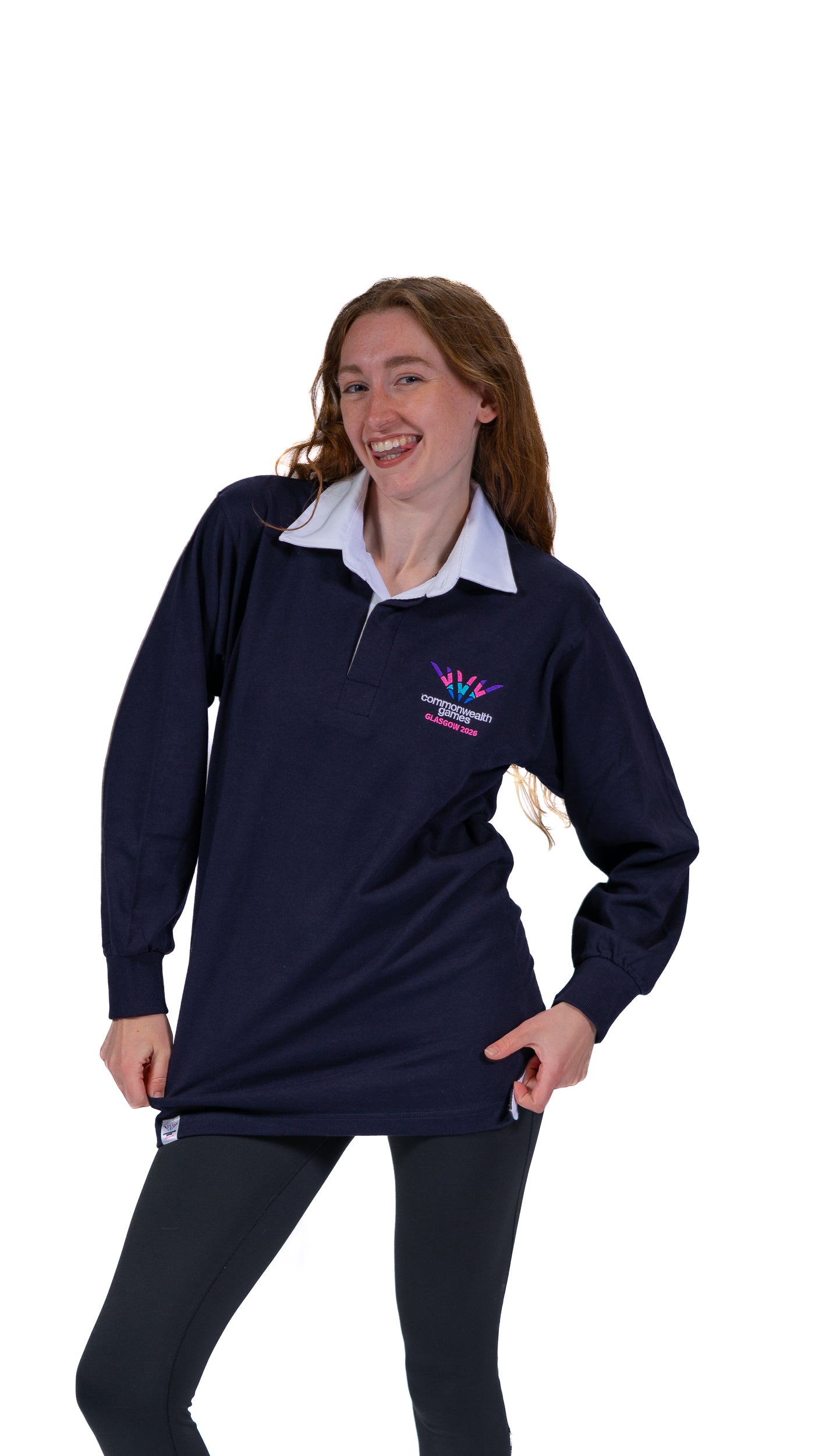 Front view of woman wearing navy rugby top with white collar with full colour Glasgow 2026 embroidered logo on the left chest.