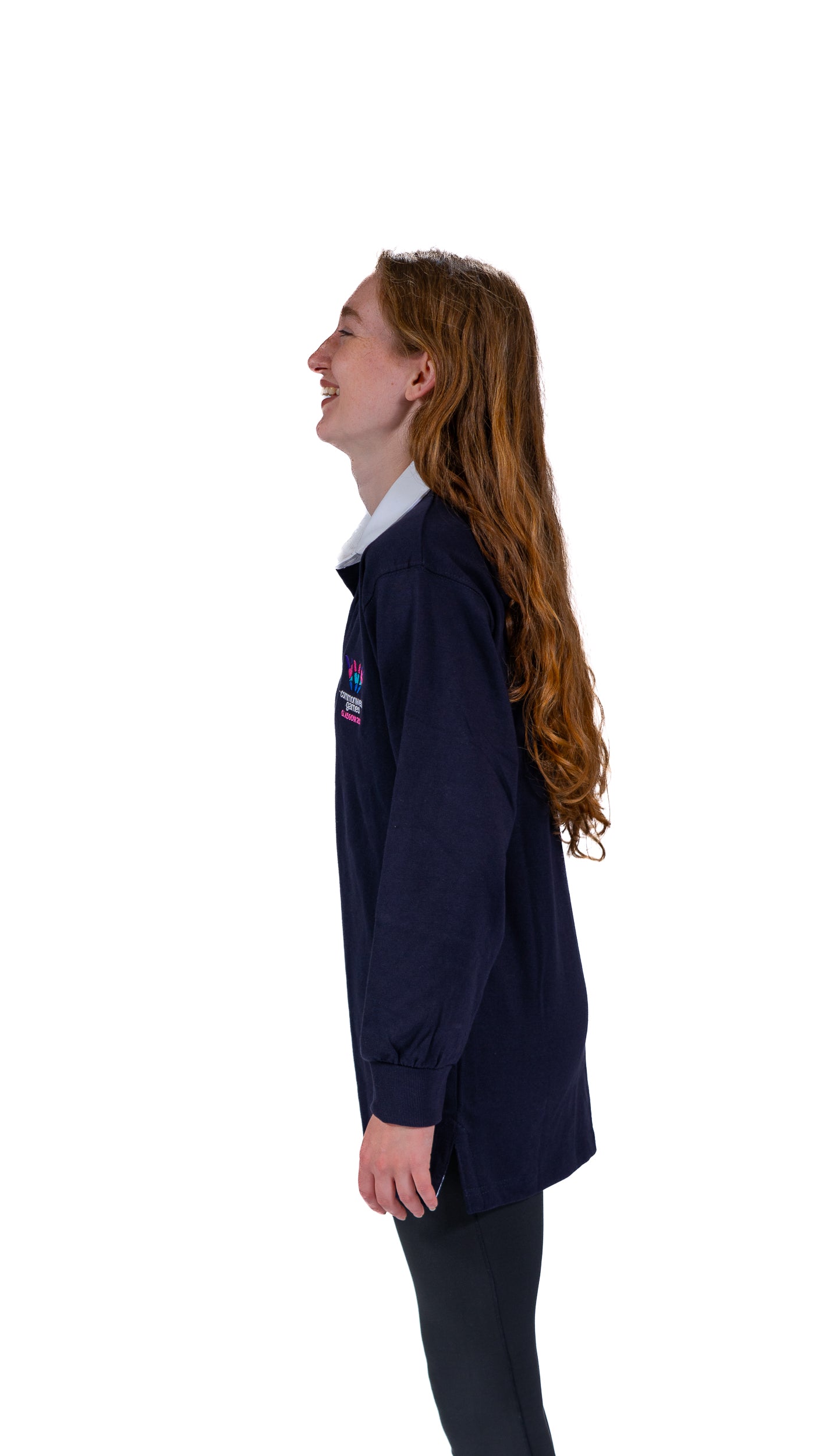 Side view of woman wearing navy Glasgow 2026 logo rugby top with white collar.