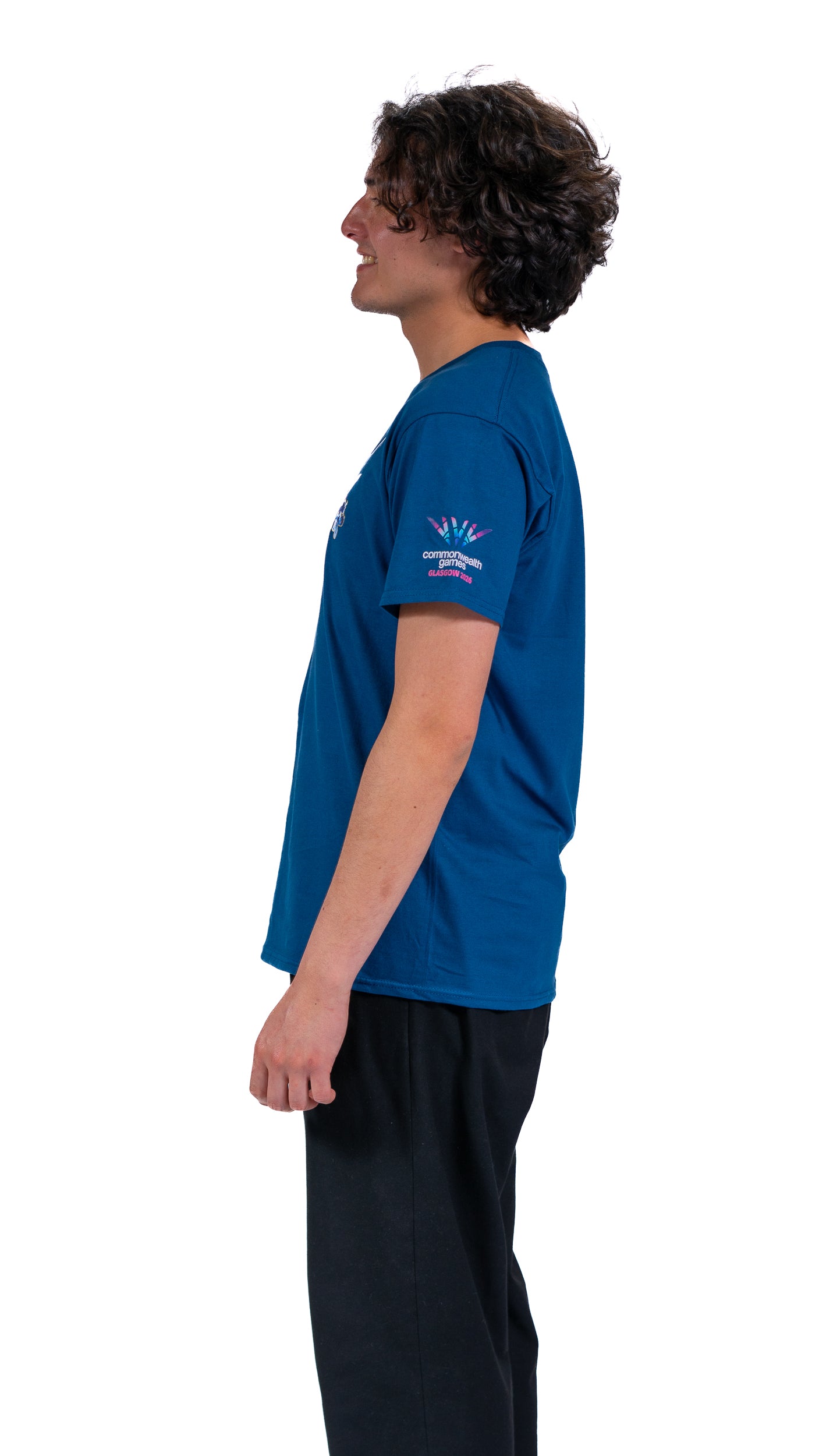 Side view of man wearing blue t-shirt with Glasgow 2026 Celebration graphic t-shirt.