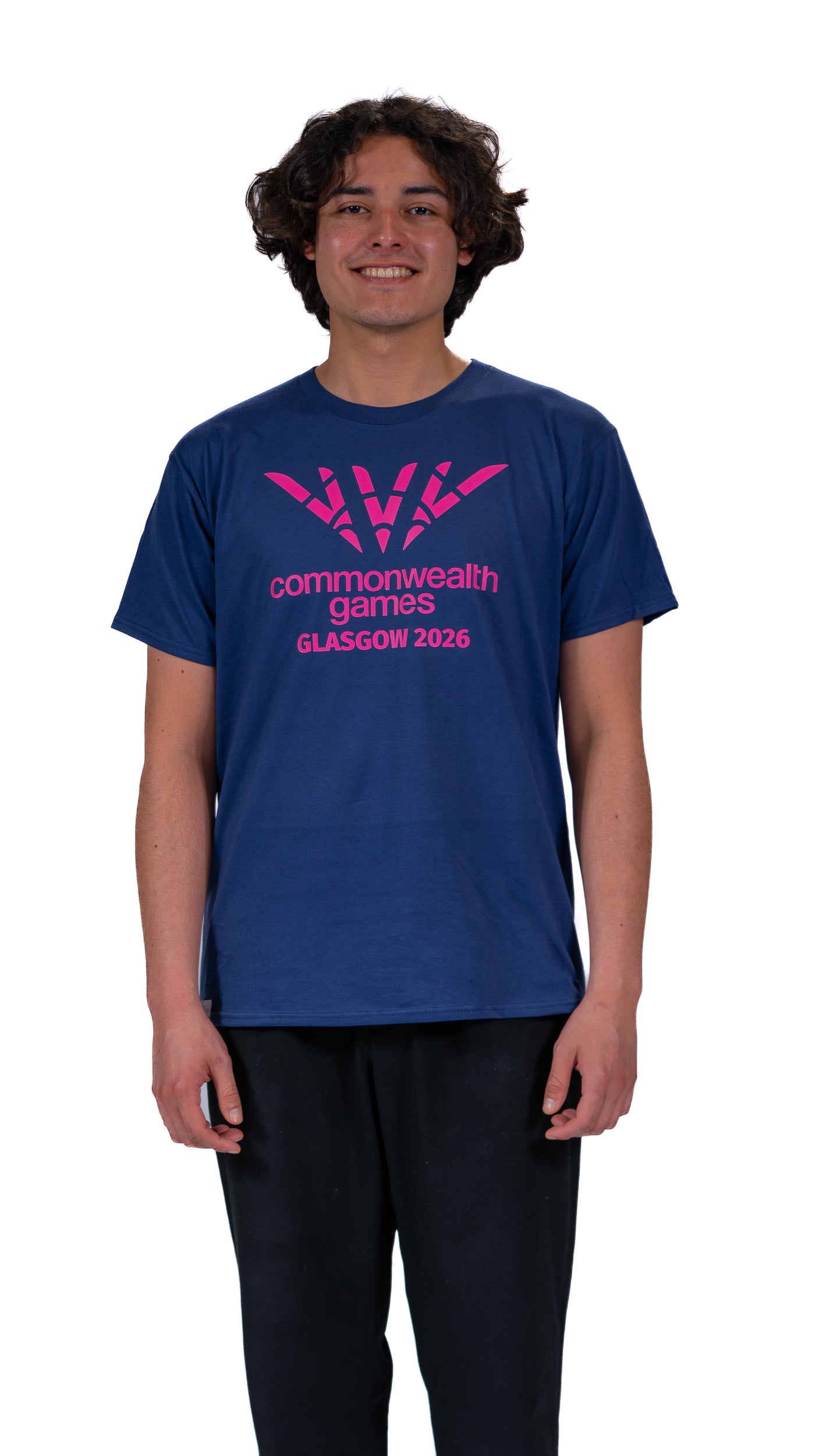 Man wearing navy t-shirt with single colour pink Glasgow 2026 logo on the front.
