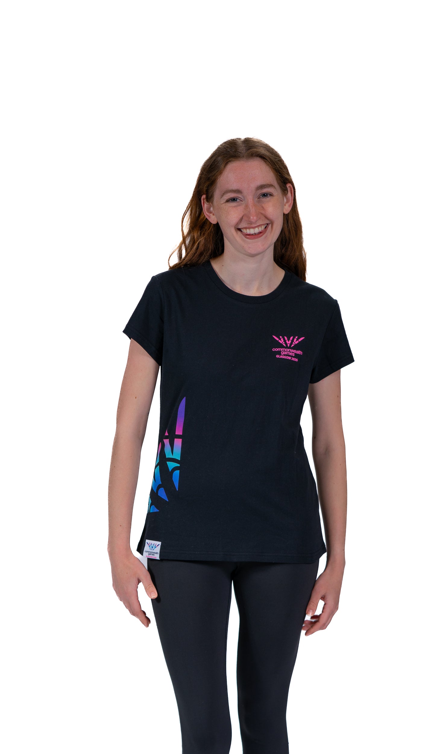 Front view of woman wearing black fitted t-shirt with Glasgow 2026 logo chest print and Celebration mark side print.