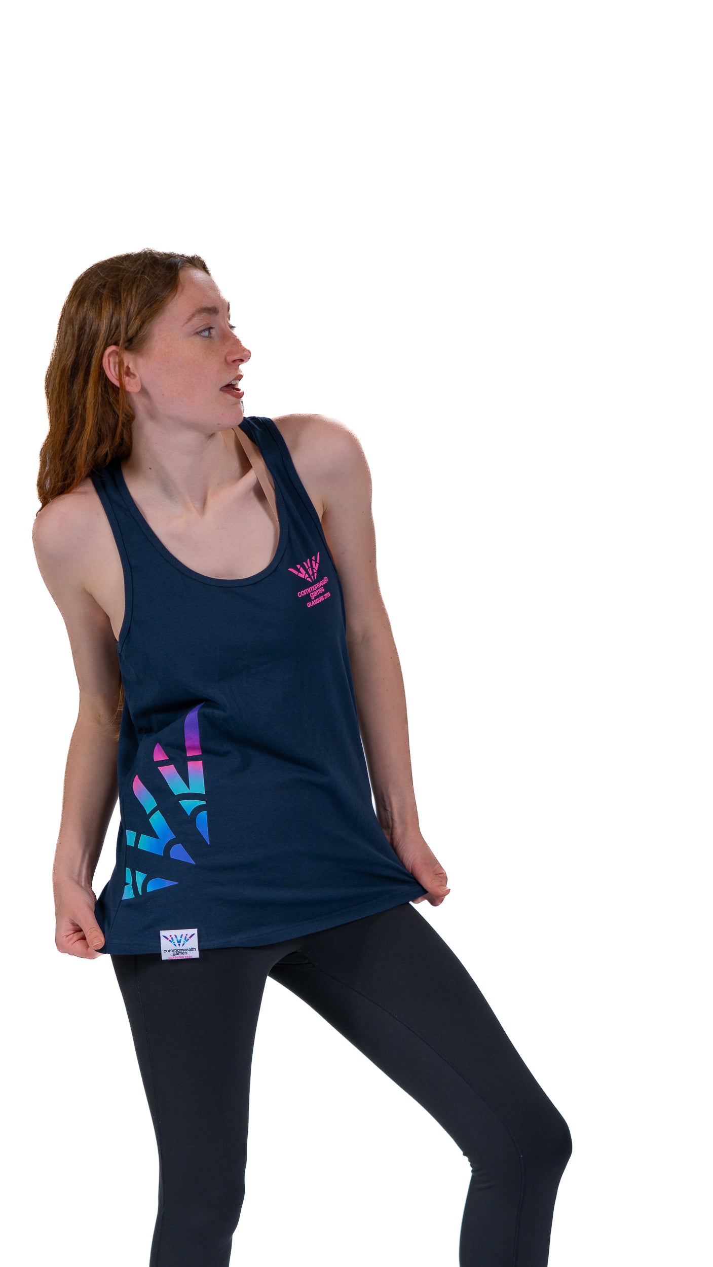 Side view of woman wearing fitted navy vest with Glasgow 2026 logo on the left chest and Celebration mark side print.