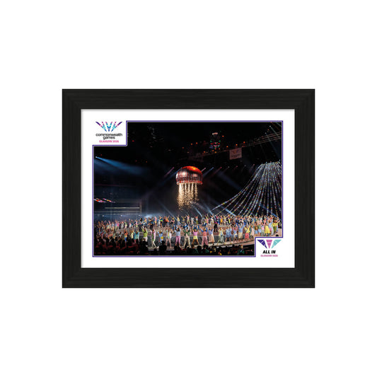Glasgow 2026 Opening Ceremony 12' x16” Framed Image - A moment of pure Glasgow. The Opening Ceremony's giant tea cake, suspended in a shower of golden sparks above a celebrating arena.