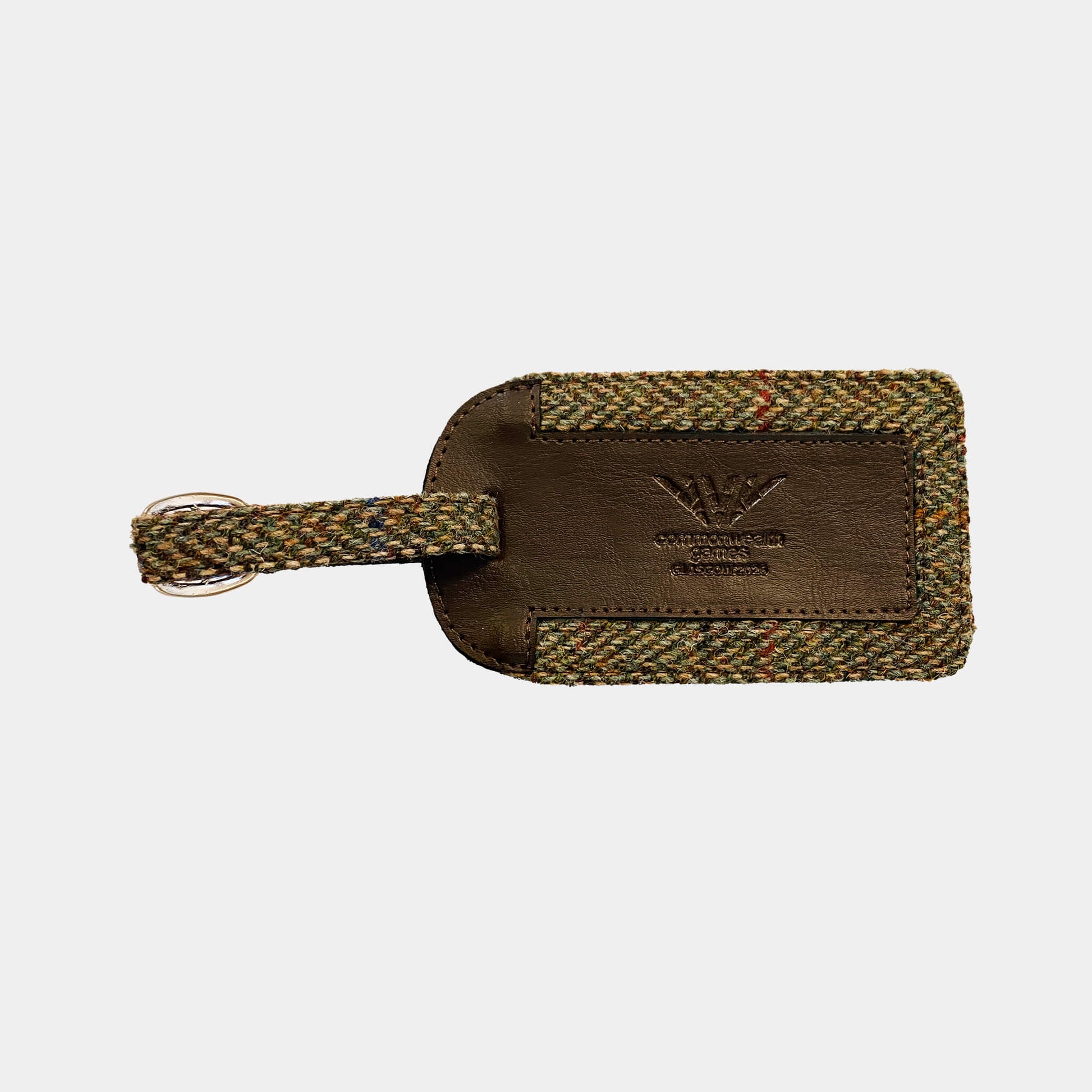 Front view of Glasgow 2026 Country Green Harris Tweed Luggage Tag on grey background 