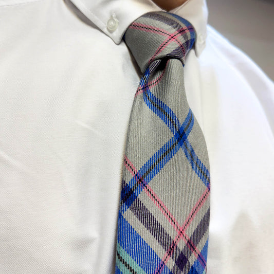 Man wearing Glasgow Official Tartan Tie made with 100% lambswool