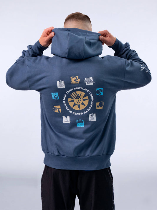 Back view of Atlantic Blue G2026 x Team Scotland Sport Icons Oversized Hoodie worn by athlete Pavel Karnejenko.
